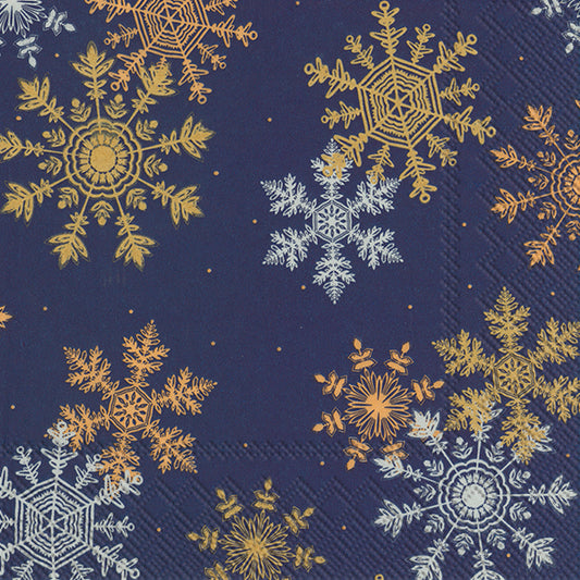 Confezione di 20 tovaglioli di carta a 3 veli decorati con cristalli di neve con fondo blu scuro. Dimensioni: cm 33 x 33. Made in Germany. In negozio e online su tuttochic.live