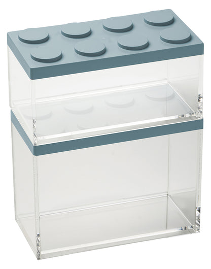 Barattolo contenitore ermetico in acrilico trasparente con coperchio in stile Lego, assemblabili e modulabili. Utilizzabili non solo in cucina, lavabili in lavastoviglie, idonei al contatto alimentare. Dimensione: cm.10 x 20 x h 15,5  Capacità: lt. 2 Colore: azzurro polvere Made in Italy