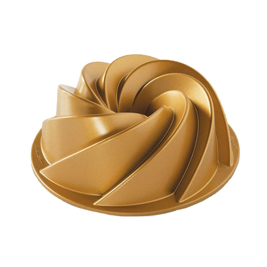 Stampo per Bundt Heritage della serie Premium  stampo Bundt per le occasioni importanti, per un'eleganza sopra le righe.• Rivestimento interno antiaderente• Made in USA. In negozio e online su tuttochic.live