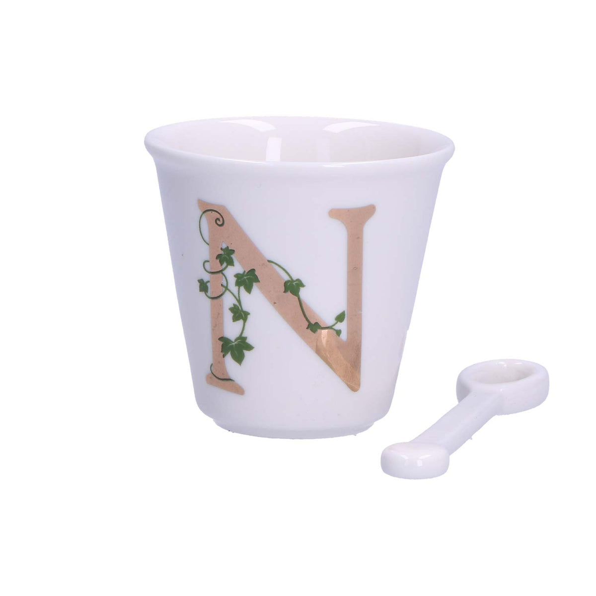 "Unico" Bicchierino in porcellana con iniziale decorata e cucchiaino. Capacità 75 cc Dimensioni: diametro cm 6,7- altezza cm 6 Lavare a mano 