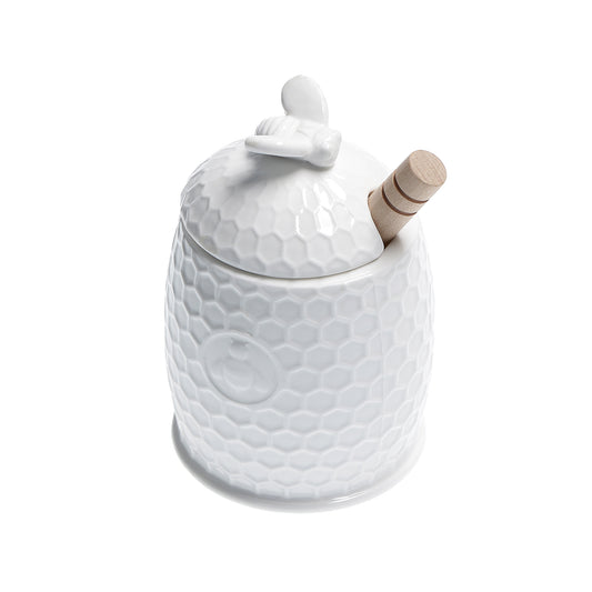 Vasetto in porcellana bianca con servimiele in legno. Dimensioni:&nbsp;h12 cm, Ø 8 Lavabile in lavastoviglie Utilizzabile in microonde Utilizzabile in forno tradizionale. In negozio e online su tuttochic.live