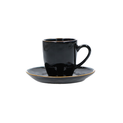 Tazzina caffè con piattino di colore nero della linea Concerto.  L’apparecchiatura è bellissima tono su tono o nei diversi abbinamenti di colore. Materiale: Stoneware Capacità: 90 cc Lavabile in lavastoviglie. Utilizzabile in microonde. Non Utilizzabile in forno tradizionale. In negozio e online su tuttochic.live