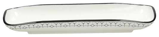 Vassoietto rettangolare in ceramica decorata di colore bianco e nero. Dimensioni: cm 29 x 10.&nbsp;Per alimenti, utilizzabile in lavastoviglie e microonde. In negozio e online su tuttochic.live