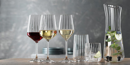 Set di 4 calici champagne in vetro cristallino lavorato. Dimensioni: mm 75 x 223 h - Capacità: 310 ml. Lavabile in lavastoviglie. In negozio e online su tuttochic.live