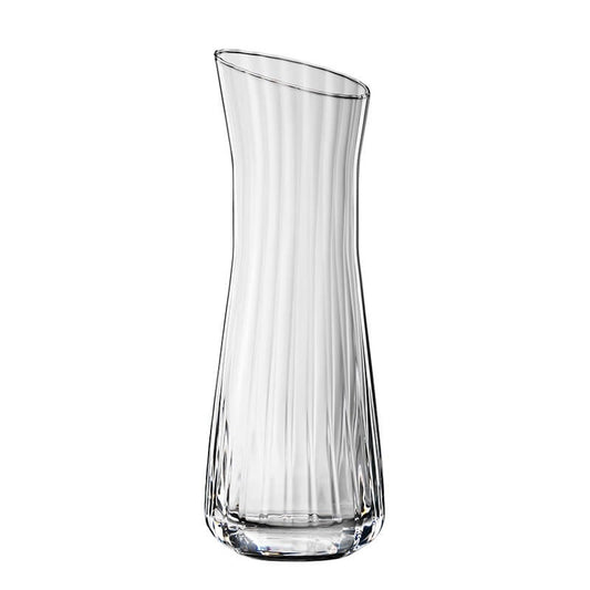 Caraffa in vetro cristallino lavorato. Dimensioni: mm 75 x 223 h - Capacità: 310 ml. Lavabile in lavastoviglie