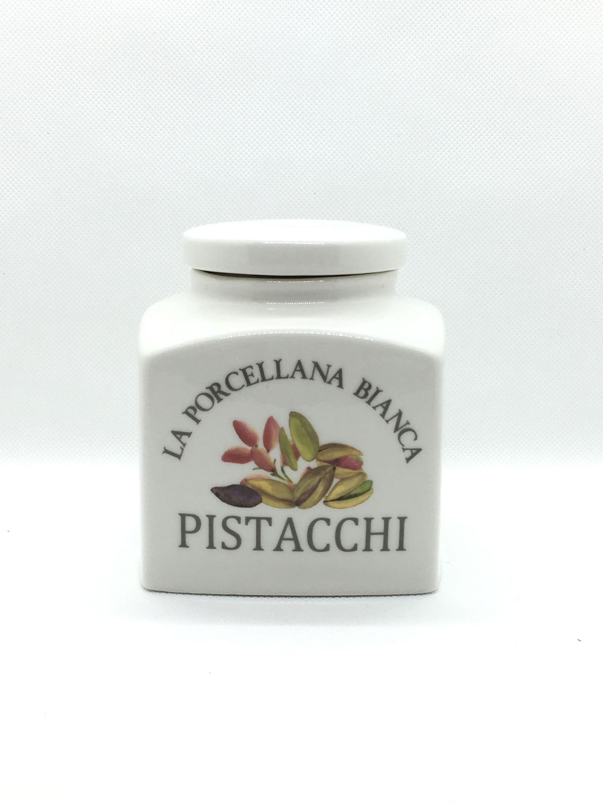 Barattolo porcellana con scritta decorata Pistacchi Dimensioni : 9,5x9,5 x h11 cm. Capacità 500cc Portano colore in cucina i funzionali barattoli Conserva, con un’intuitiva illustrazione per catalogare spezie, tè, caffè e tisane, tutti dotati di un pratico tappo a chiusura ermetica. In negozio e online su tuttochic.live